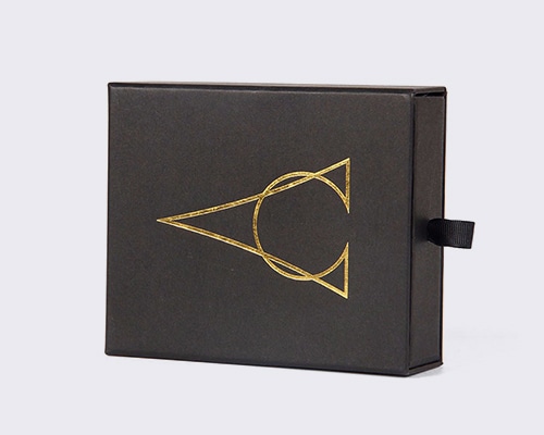 black drawer box with gold logo